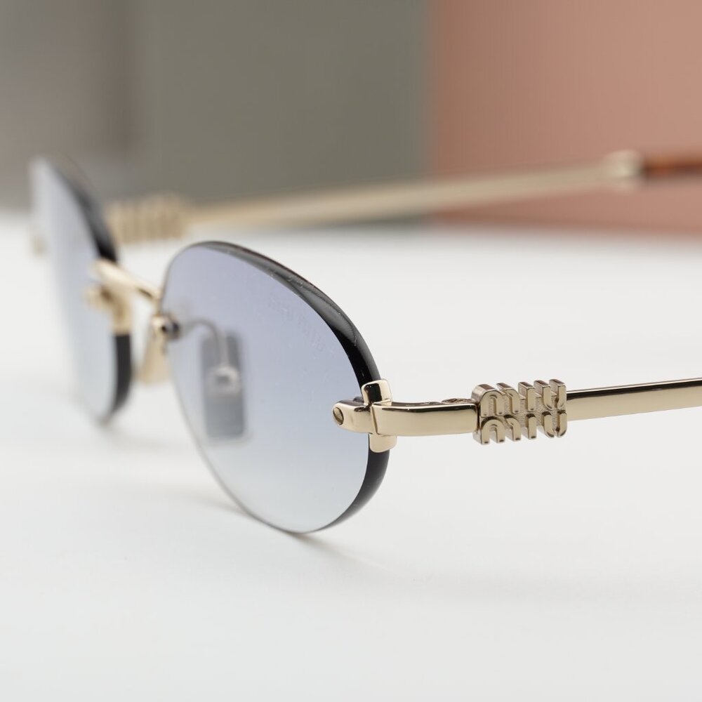 Miu Miu MUA54S ZVN80O Oval Sunglasses – Pale Gold\Clear Gradient Light Blue - Picture 9 of 10